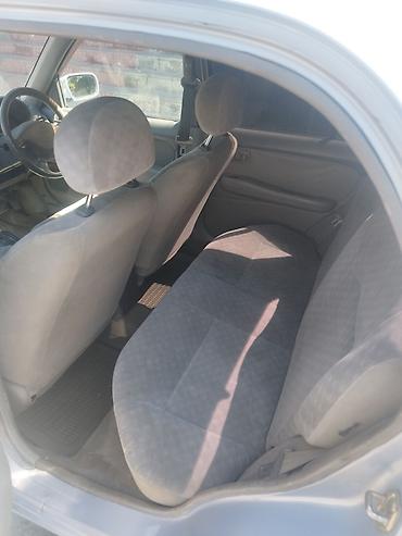 nardo grey: Nissan March: 2001 г., 1 л, Автомат, Бензин, Хэтчбэк — 4