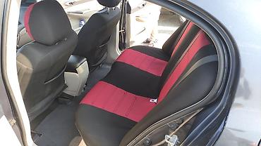 Honda: Honda Civic: 1.3 l | 2006 il Sedan — 9