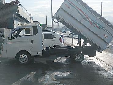 разгружаю: Грузовой мини‑самосвал Hyundai Porter с гидроподъёмом кузова — 2