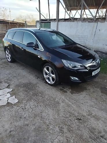 baqaji: Opel Astra: 1.4 l | 2011 il 310000 km Universal — 1