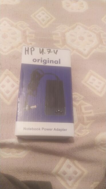 toshiba üçün adapter: Teze alınmış işlenmemiş orjinal HP adaptörü 30 manata U.74