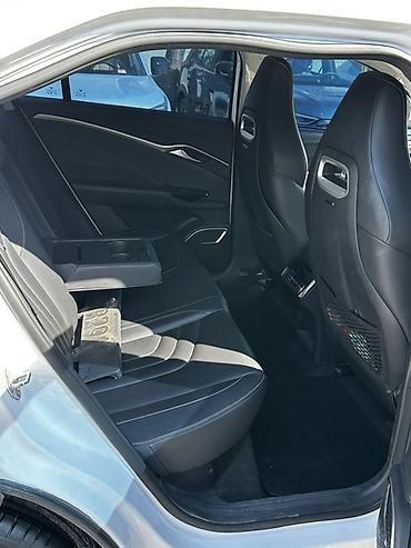 jeely coolray: Электромобиль Skyworth Skyworth EV (бренд-логотип на кузове), белый — 10
