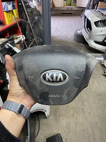 Подушка безопасности водительская (AIRBAG) для рулевого колеса Kia. -