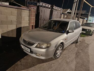 срочно продаю в связи с переездом: Mazda 323: 2003 г., 1.5 л, Механика, Бензин, Седан