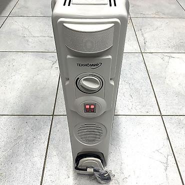 Масляные обогреватели: Масляный обогреватель Кол-во секций: 9, Отключение при падении, Защита от замерзания, Быстрый нагрев — 12