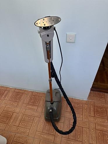 Paltar buxar ütüsü – şaquli steamer - Güclü buxar çıxışı ilə köynək