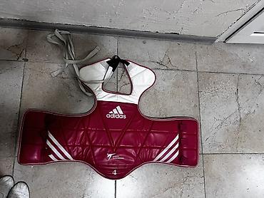 adi: Защитный жилет (даян) для тхэквондо Adidas. - Официальная маркировка — 1