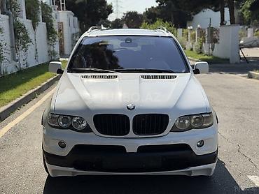 BMW: BMW X5 (E53) – ağ rəngdə, klassik “kidney” radiator barmaqlıqları və — 1