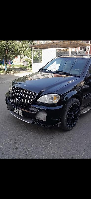 Mercedes-Benz: Mercedes-Benz M-Class (W163) SUV - Kuzov: qara rəng, şəhər və uzun — 11