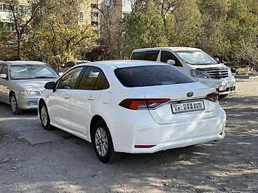canry 70: Toyota Corolla: 2020 г., 1.8 л, Гибрид, Седан — 4
