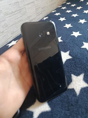 телефон fly fs520 selfie 1: Samsung Galaxy A3 2017, 16 ГБ, цвет - Черный, Отпечаток пальца — 2