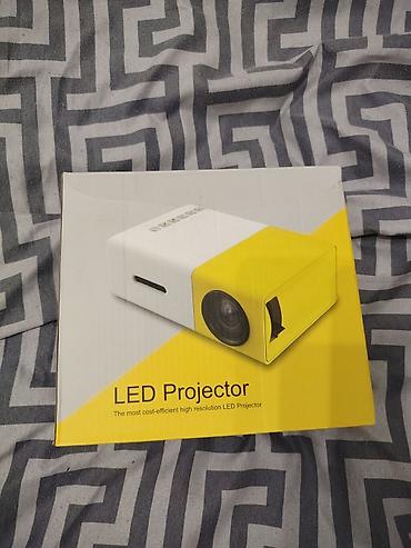TEZEDIR. LED Proyektor Kompakt və yüngül LED proyektor – evdə film