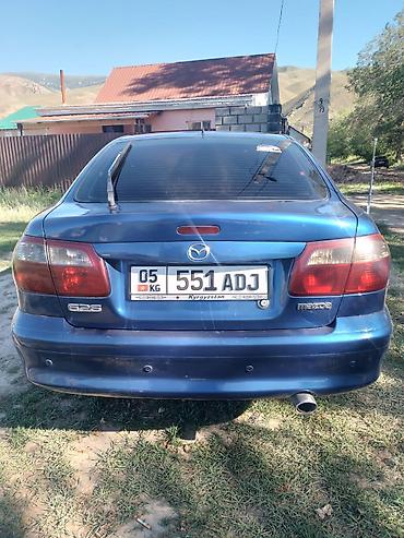 чехол на мопед: Mazda 626: 2000 г., 1.8 л, Механика, Бензин, Лифтбек — 2