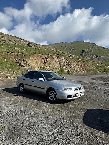 срочное: Mitsubishi Carisma: 1999 г., 1.8 л, Механика, Бензин, Седан — 1