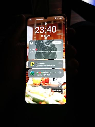 telefonlae: Smartfon – böyük ekranlı, damla-notch ön kamera kəsiyi olan model — 2