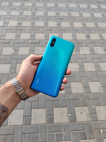 кредит на телефон: Xiaomi Redmi 9A, 32 ГБ, цвет - Голубой, 
 Кнопочный