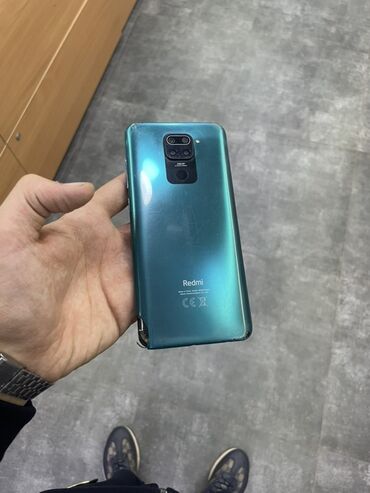 Digər mobil telefonlar: Xiaomi Redmi smartfon - Model: Redmi seriyası (arka qapaqda Redmi
