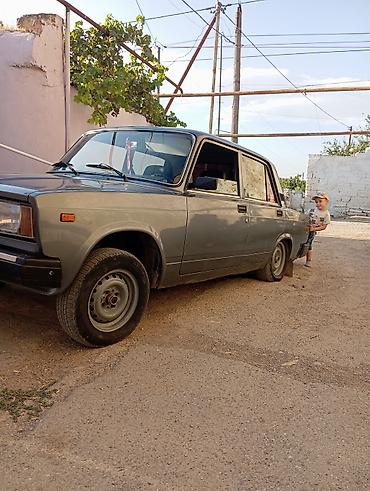 VAZ (LADA): Model: Lada 2107 sedan Rəng: Tünd boz/göy tonları Kuzov: 4 qapı — 5