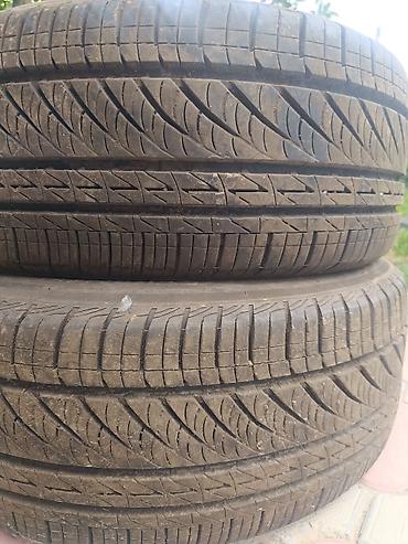 black edition: Летние шины Bridgestone Turanza ER300, 2 шт. (пара) - Размер: 205/60 — 1