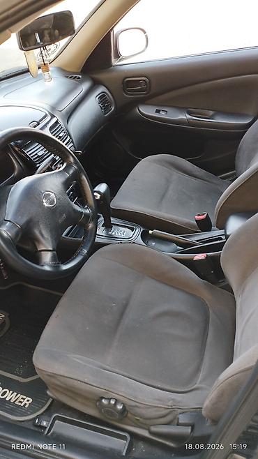 oka satışı: Nissan Almera Classic sedan – qara rəng, 4 qapı, 5 yerlik. Texniki — 4