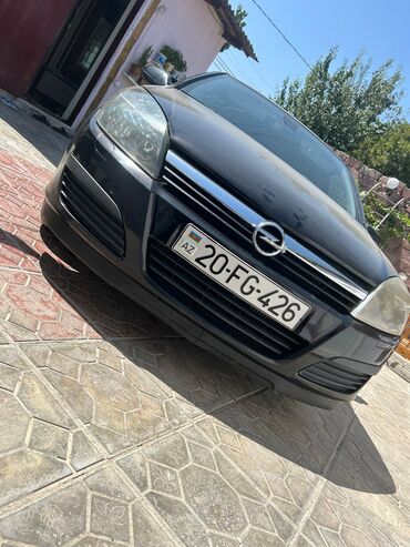 Digər Avtomobillər: Opel Astra H – 5 qapılı hatchback Xarici: - Qara rəng, “Sport”