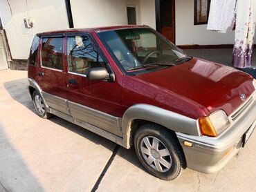 дом на обмен: Автомобиль Daewoo Tico красного цвета с элементами серого пластика по