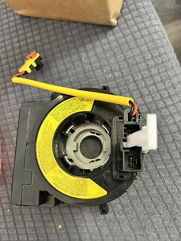 Lentlər: Məhsul: SRS/airbag sükan lent kabeli (clock spring) Təsvir: - Sükanın — 4