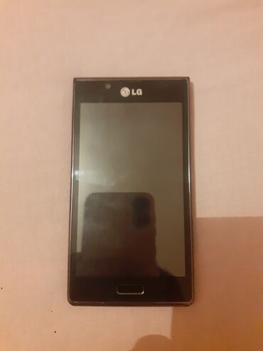 дешевые телефоны флай: LG L35, цвет - Черный, Сенсорный