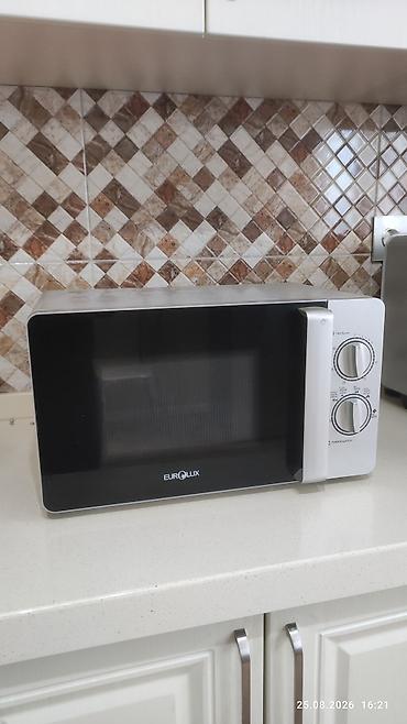 Mikrodalğalı sobalar: Mikrodalğalı soba Eurolux, Ayrıca dayanan, Mikrodalğalar ilə, rəng - Gümüşü, Yeni — 1