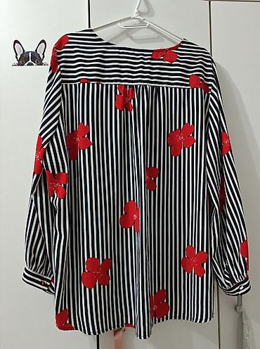 defender pantalone: Ženska bluza brenda **Wite+**, u veličini **44**. Model je izrađen u — 2