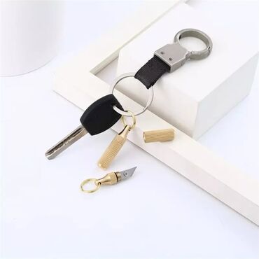 купить брелок на ключи: Латунный мини острый нож виде капсулы, очень удобно пользоваться.есть