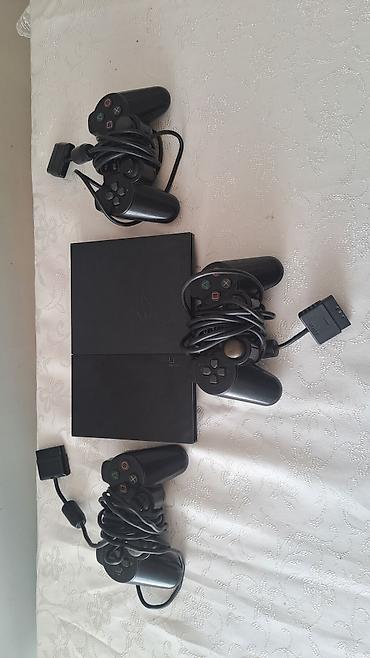 playstation rol: PlayStation 2 Slim komplekti - Konsol: Sony PlayStation 2 Slim — 1