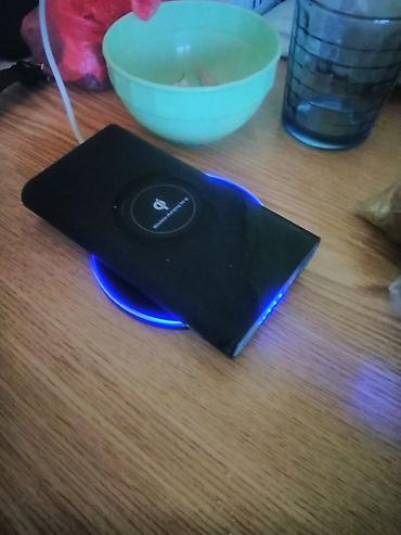 kako puniti iqos iluma prime: Bežični punjač kružnog oblika, crne boje, sa mogućnošću brzog — 3