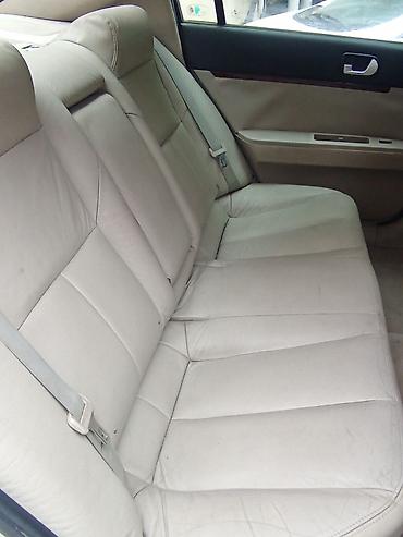 mitsubisi: Mitsubishi Galant sedan Xüsusiyyətlər: - Kuzov: ağ rəngli sedan, 4 — 3