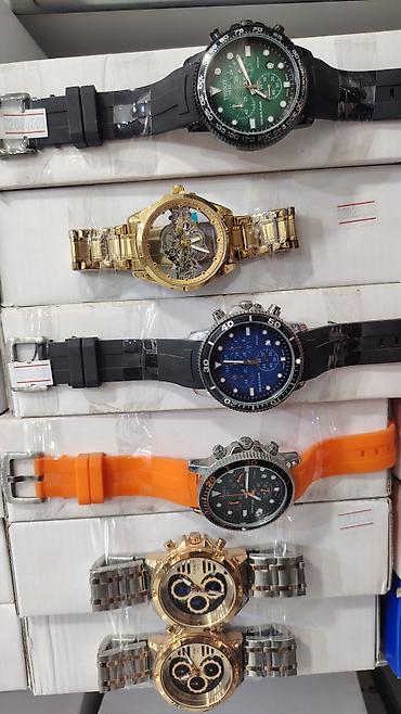 meta eynək: Müxtəlif dizaynlarda kişi qol saatları kolleksiyası Rolex, Rolex saat — 4