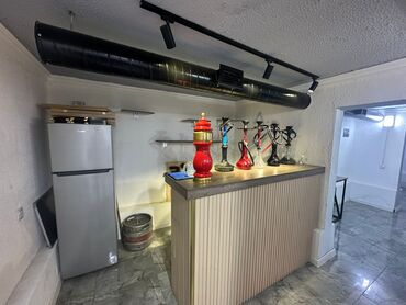Digər kommersiya daşınmaz əmlakı: Əhmədlidə Qacaq nebi kucesinde gedis gelisli yerde cayxana pub icareye