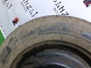 2 gr: Колесо докатка на штампованном диске Параметры: - Размер: R15 - Шина — 7