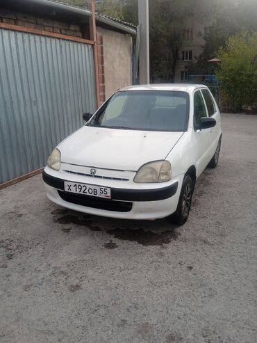 Honda: Honda Logo: 1999 г., 1.2 л, Автомат, Бензин, Хетчбек