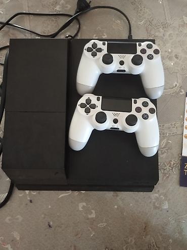 irşad iphone 11 pro: PlayStation 4 (PS4) oyun konsolu 2TB yaddaşı var prasifka modeldir — 5