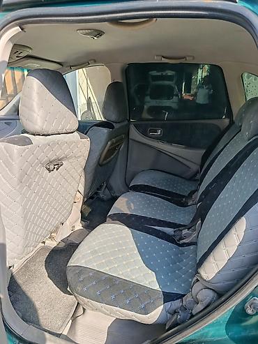 lider auto: Компактвэн (5 дверей) зелёного цвета. Кузов/экстерьер: - Формат — 7