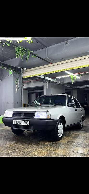 cankan masin: Model: Tofaş Dogan sedan Rəng: Gümüşü/boz, qara bamper və qoruyucu — 4
