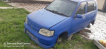 Nissan Cube (кузов Z10), правый руль, хэтчбек 5‑дверный. Цвет синий at lalafo.kg Nissan Cube (кузов Z10), правый руль, хэтчбек 5‑дверный. Цвет синий
