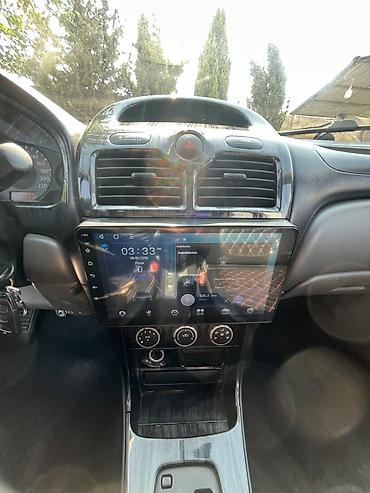 masin cip: Nissan Sunny: 1.6 l | 2008 il Sedan — 8