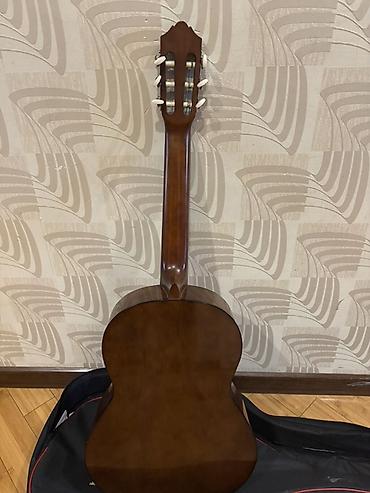 Gitaralar: Klassik gitara, Yamaha, İşlənmiş, Ünvandan götürmə — 3