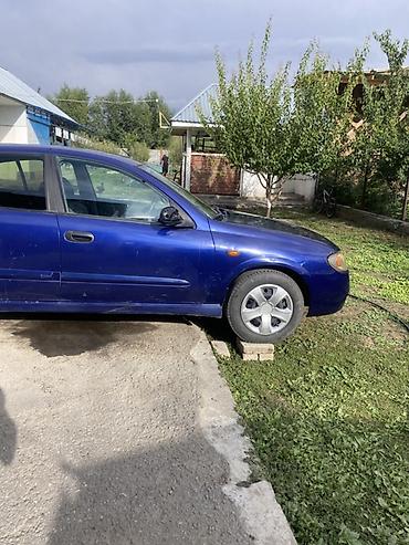 салон для машины: Nissan Almera: 2003 г., 1.5 л, Механика, Бензин, Хэтчбэк — 7