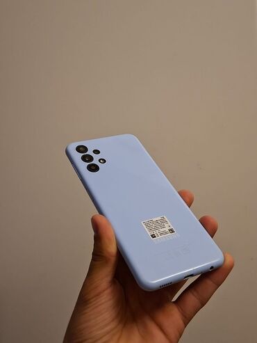 paltaryuyan 10 kq: Samsung Galaxy A13, 32 ГБ, цвет - Голубой, Отпечаток пальца, Две SIM карты, Face ID