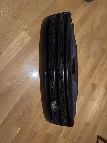 range rover disk: Land Rover Discovery 5 ön radiator barmaqlığı (orijinal emblemli) — 2
