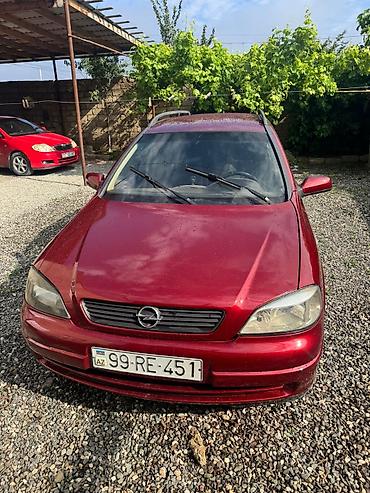 opel astra benzin: Opel Astra Caravan (Universal), qırmızı gövdə yalnız kredetlə — 4
