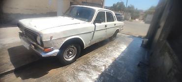 24 volqa: Model: GAZ Volga (GAZ-24 seriyası) Kuzov: sedan, ağ rəng Nömrə nişanı — 2