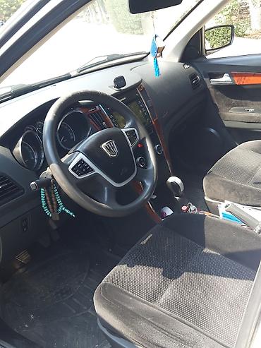 turbo az uvaz: Ağ rəngli sedan avtomobil Xarici: - Ağ gövdə, arxa park sensorları - — 5
